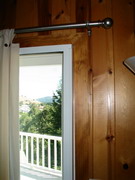 Home office, corner of sliding glass door, after installing Soundproof Windows