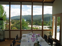 The noisy freeway is just outside of the dining area