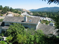 Freeway is visible from the rear of the house