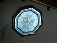Soundproofing this stained glass window will help stop the traffic noise