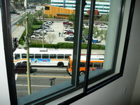 This is a large window overlooking a busy intersection