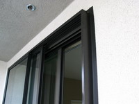 Top corner of Soundproof Windows' sliding glass door