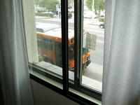 The bus stop is just outside of this unit