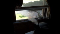Fog machine mounted inside the dwelling next to an open window
