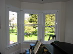 Soundproof window installation in progress.