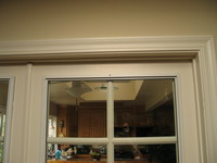Close-Up of Soundproofing Glass Panel Mounted on an Interior French Door
